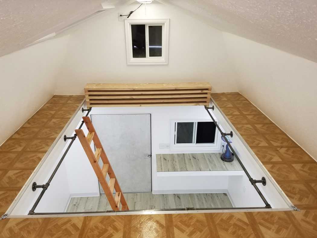 Above shot of the shed interior with a ladder and a window