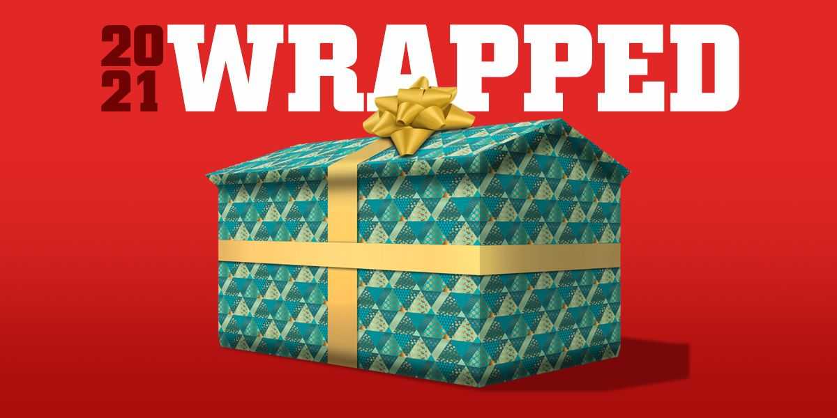 A graphic with text that reads 2021 wrapped with a wrapped tuff shed.