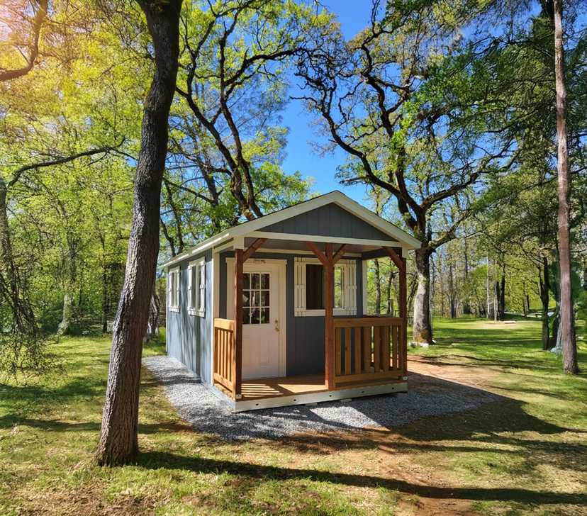 A Premier Pro Ranch Weekender in the backyard for guest space and storage.