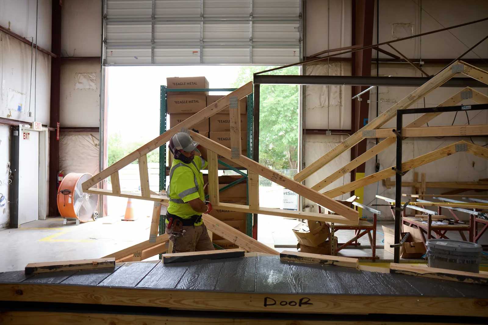 Tuff Shed employee working on a Premier PRO Tall Ranch at the Austin factory