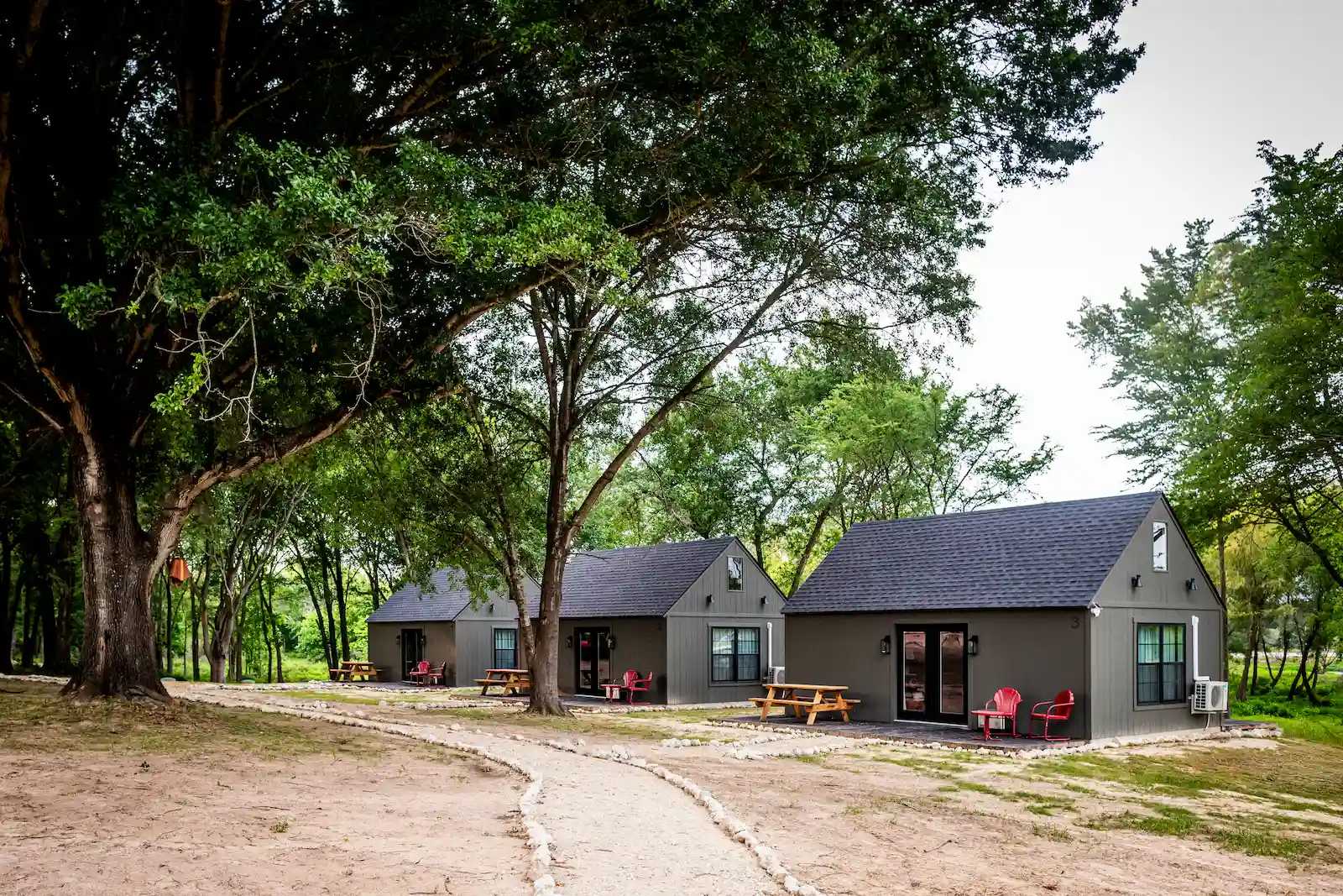 Richard Casteel Exterior of Premier Tall Ranch buildings converted to cabins