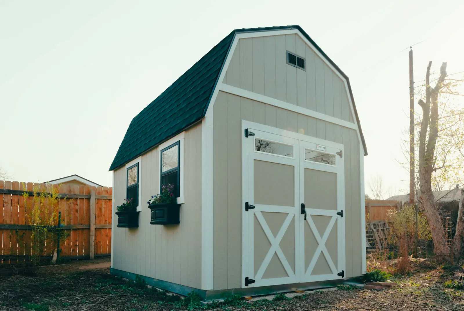 Premier Tall Barn exterior with window boxes and black single-hung windows