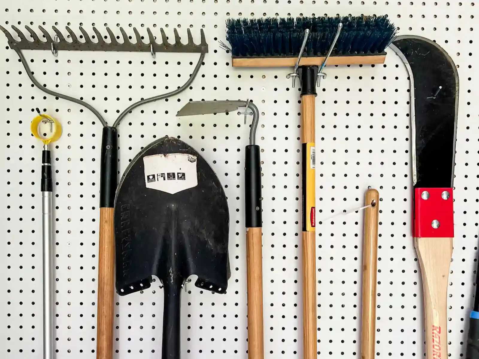 Interior of Premier PRO Tall Ranch building with organized pegboard wall