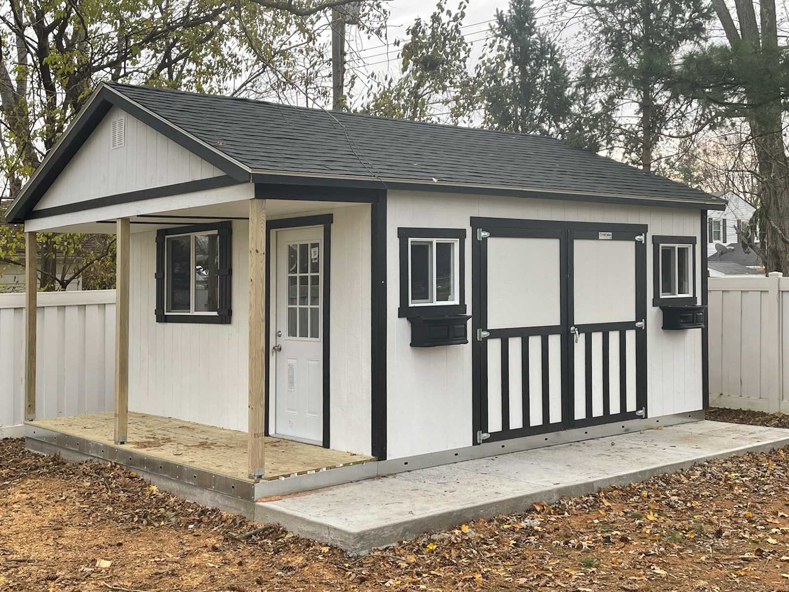 A Premier Pro Ranch Weekender in the backyard for guest space and storage.