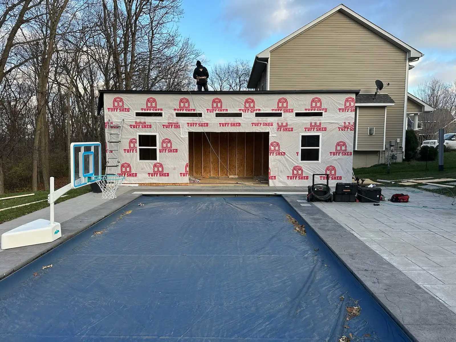 Installation of Premier Lean To shed with house wrap on front