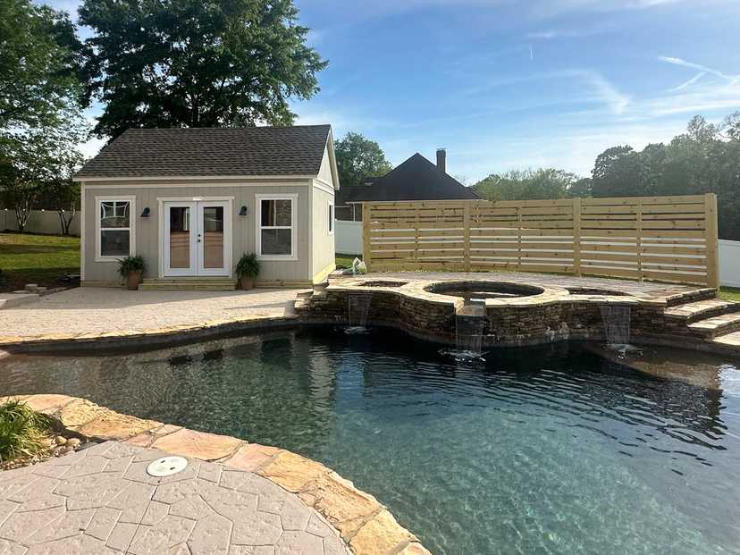 A Premier pro tall ranch Tuff Shed pool house for pool gear and storage.