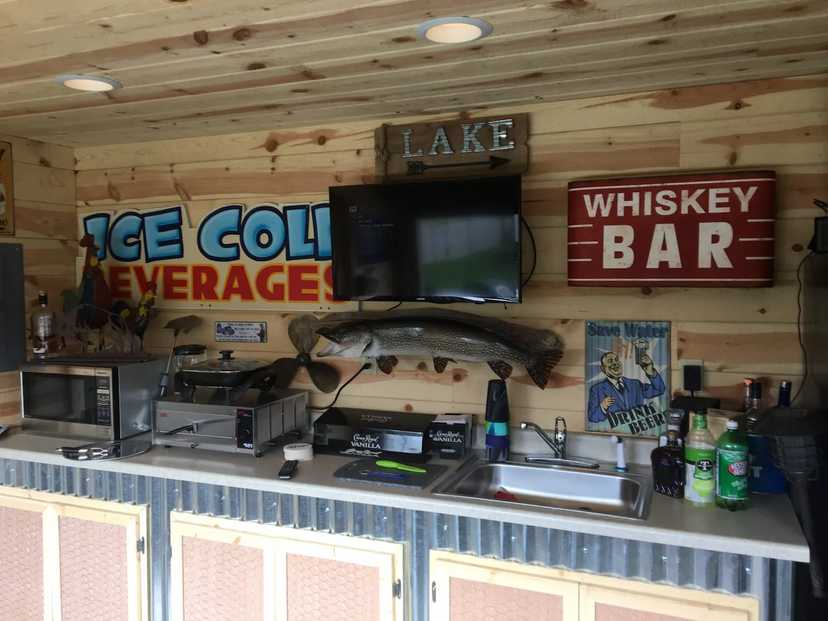 Premier tall ranch bar shed interior with bar signs