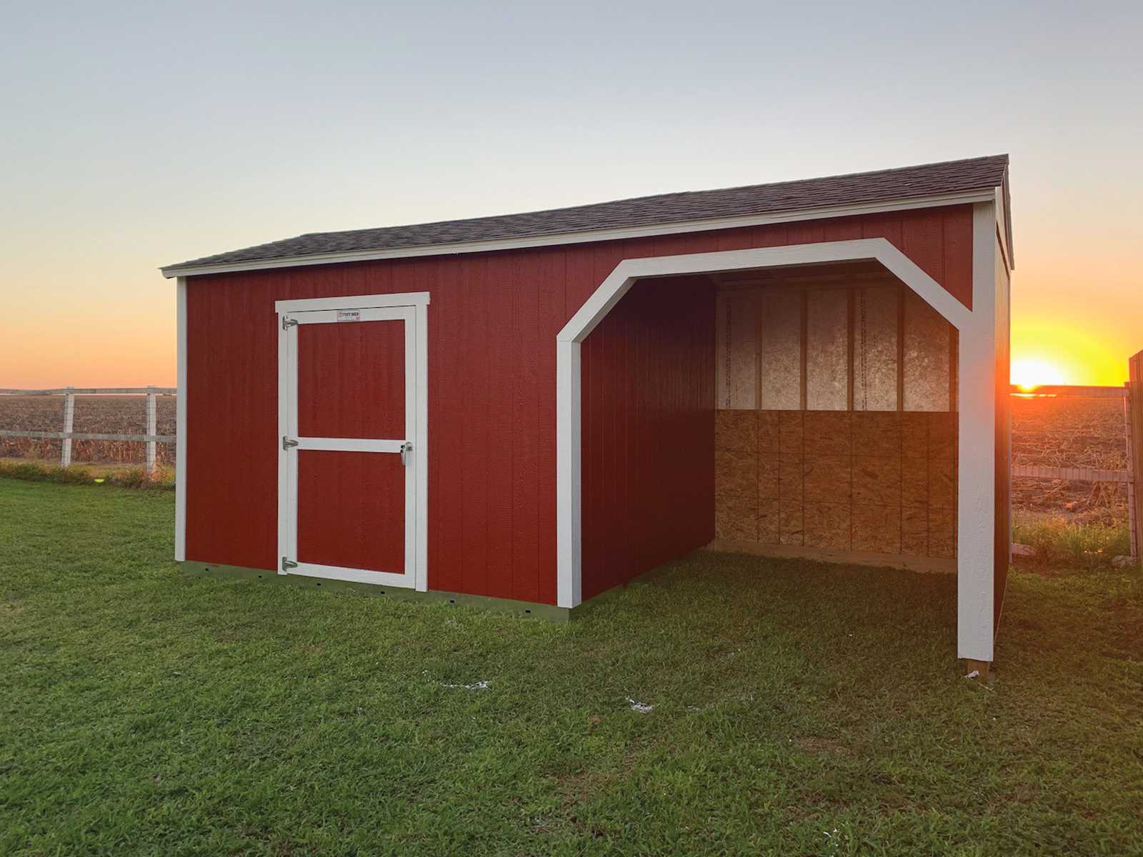 A premier loafing shed for a farm where it is being used for horses and other animals.