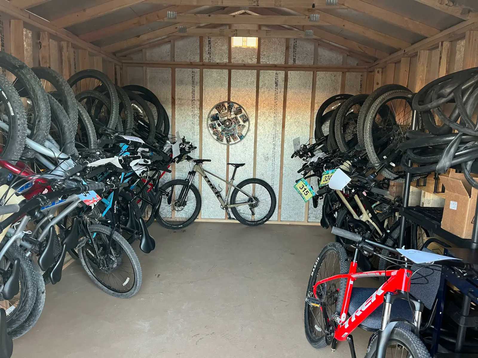 Inside of a Premier Ranch with bikes hanging on walls
