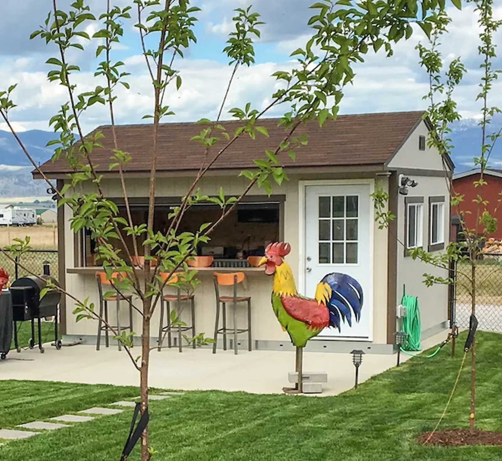 Premier tall ranch bar shed exterior with large metal rooster