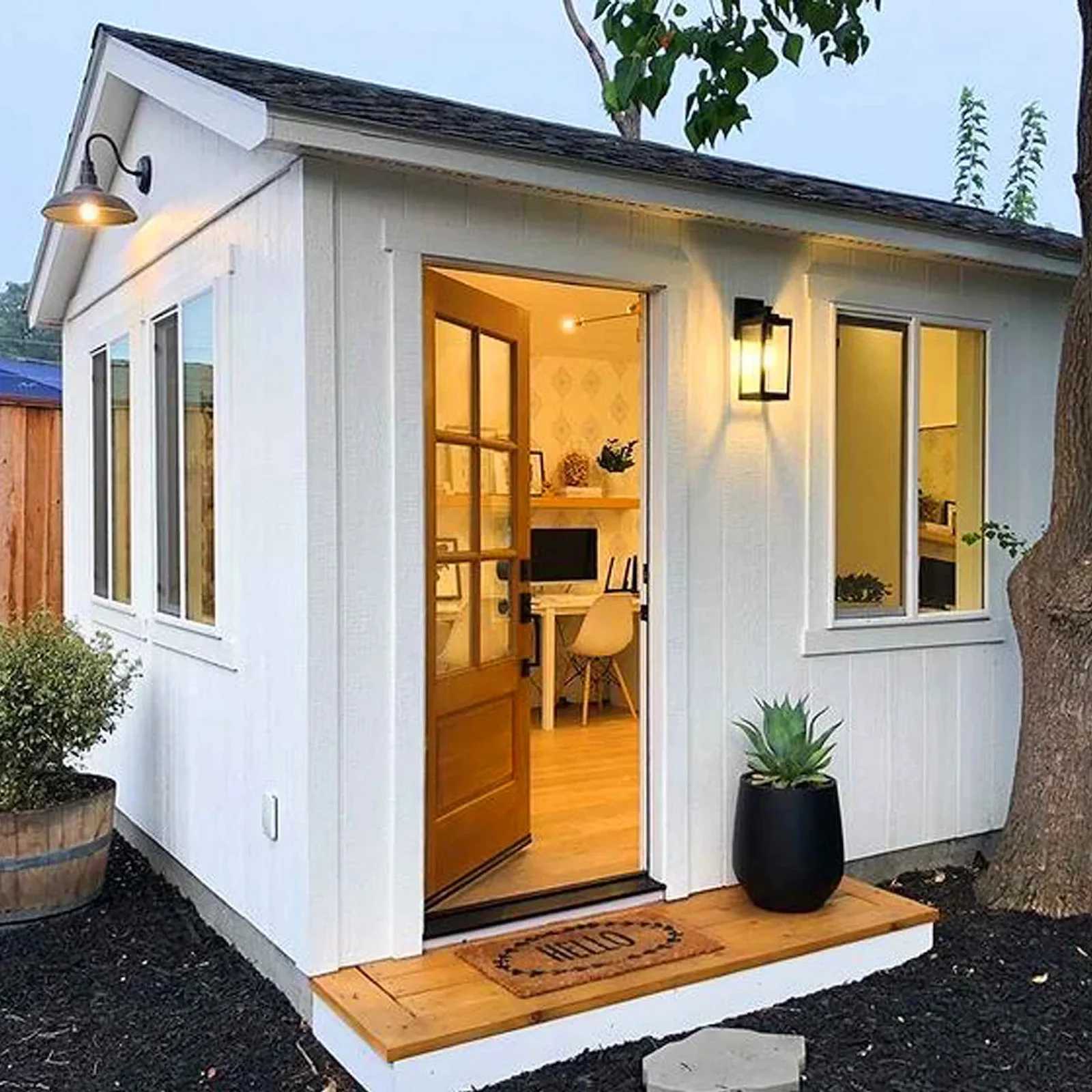 Premier Pro Tall Ranch white she shed with door slightly open