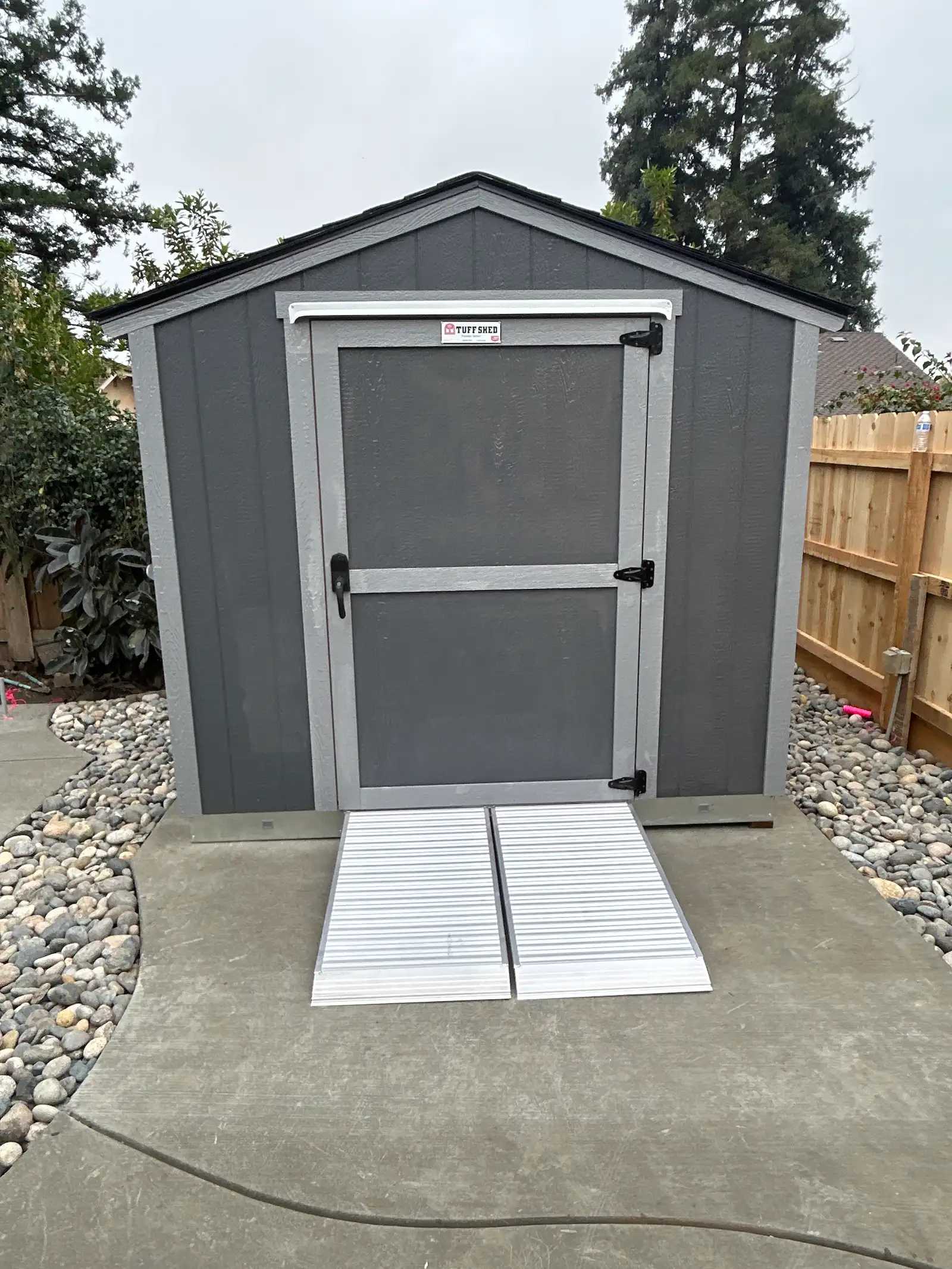 Premier Standard Ranch building on a concrete pad in a backyard with ramps