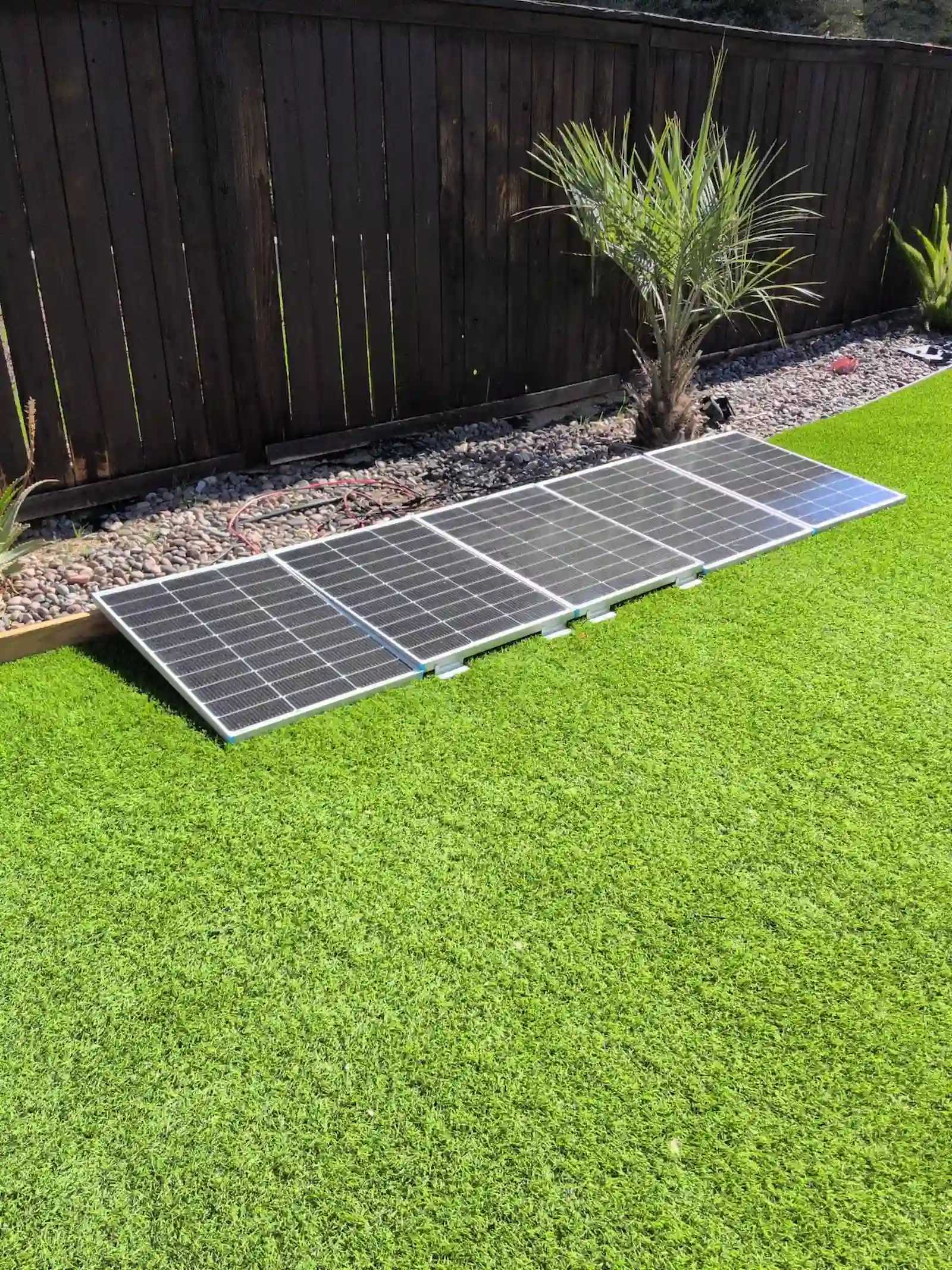 Solar panels sitting on grass