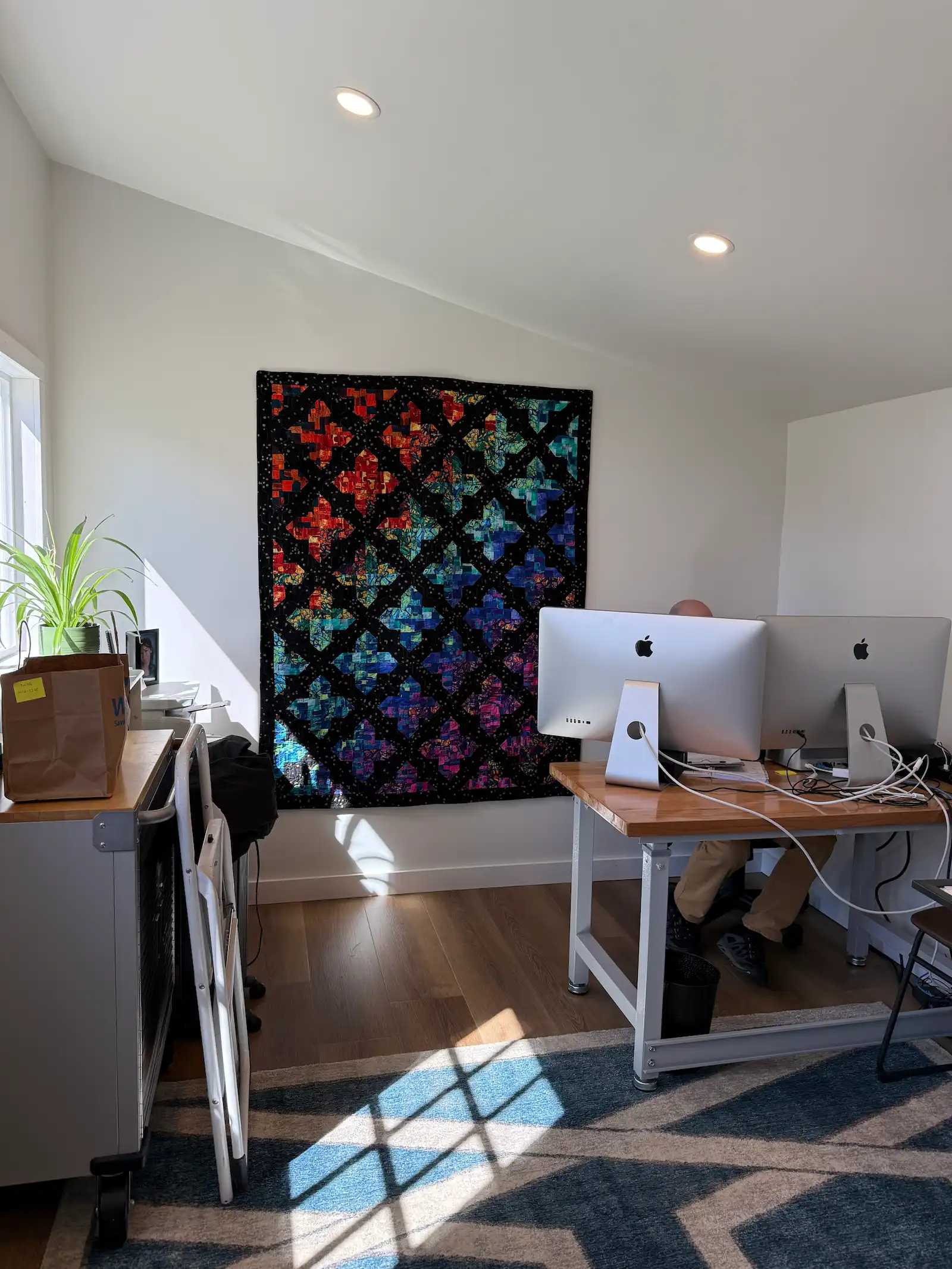 Interior of Premier PRO Studio with a quilt wall