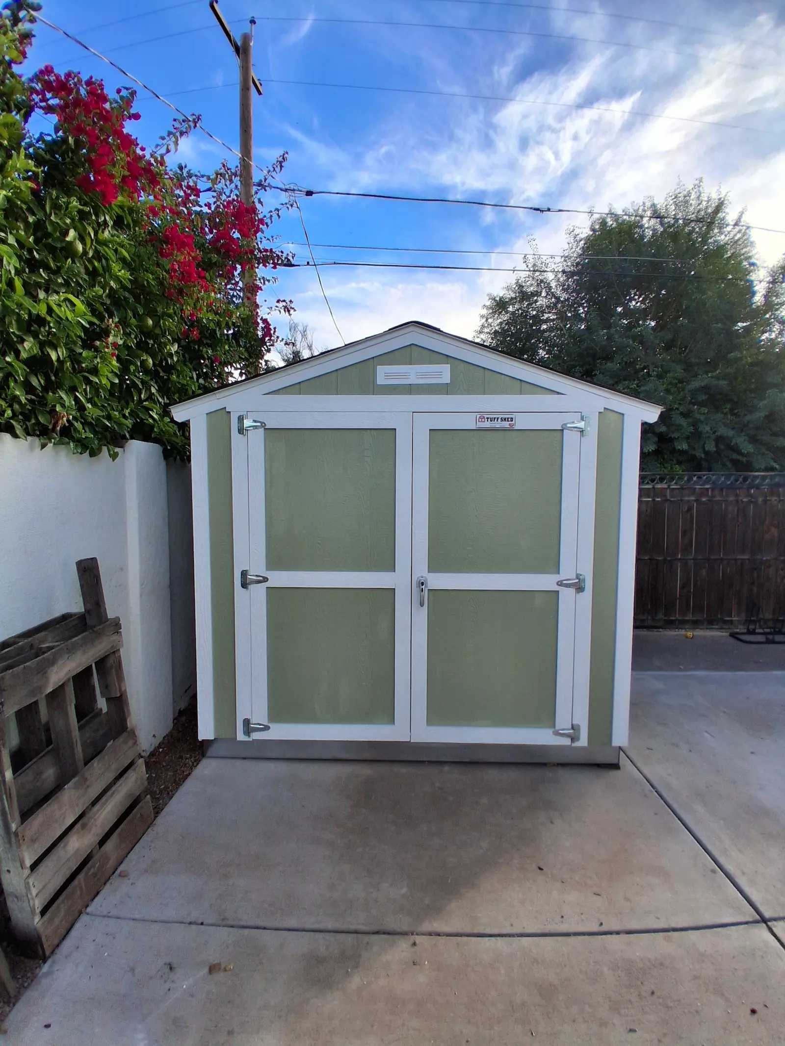Green Premier Standard Ranch on cement pad in backyard