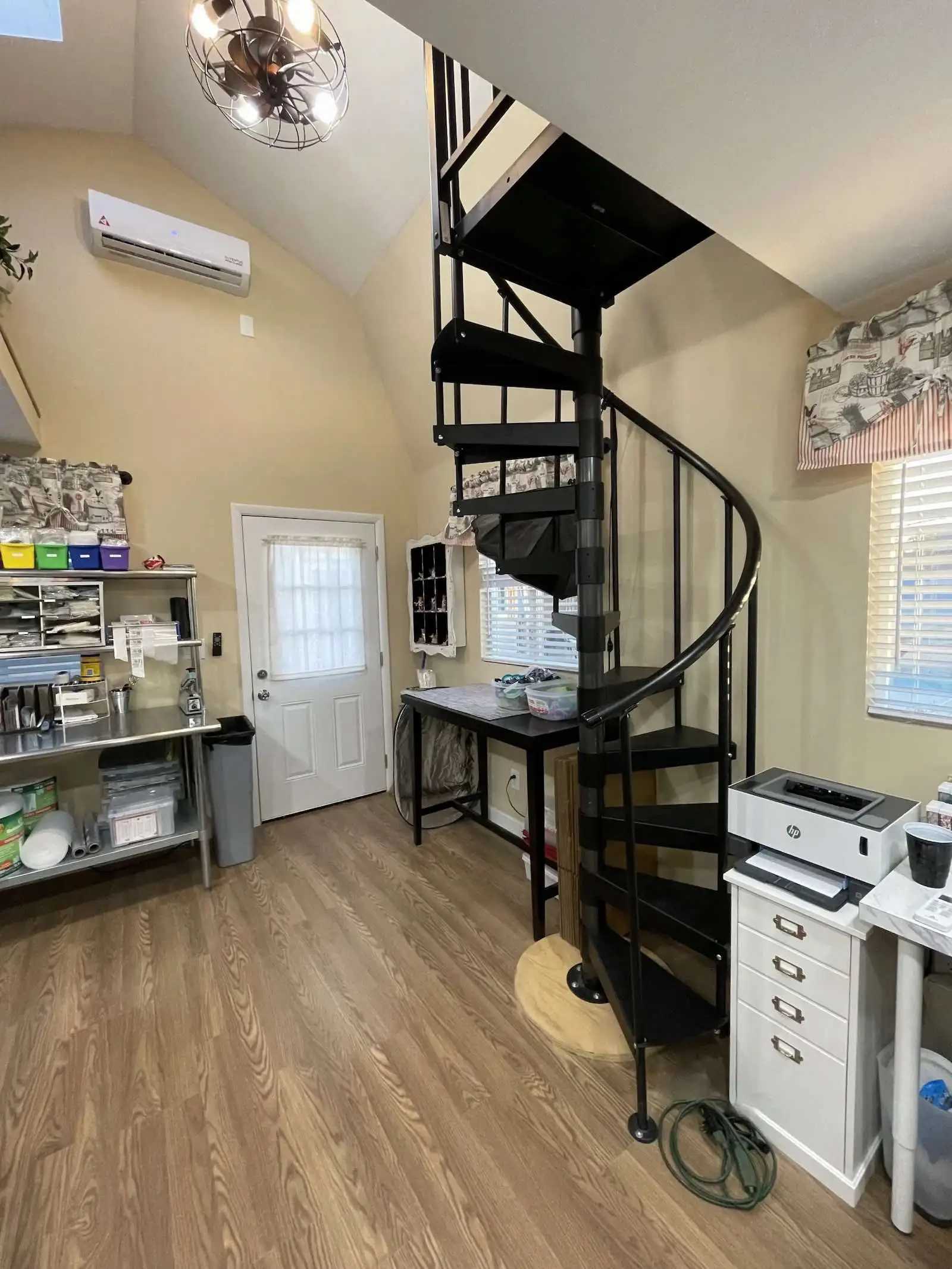 Interior of Premier Tall Barn with spiral staircase