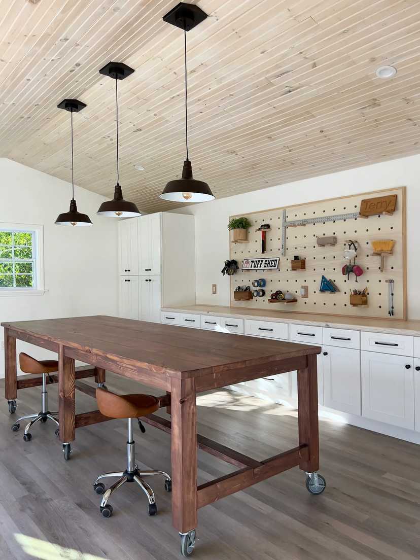 Interior of Premier Pro Ranch Garage including a work station and pegboard system