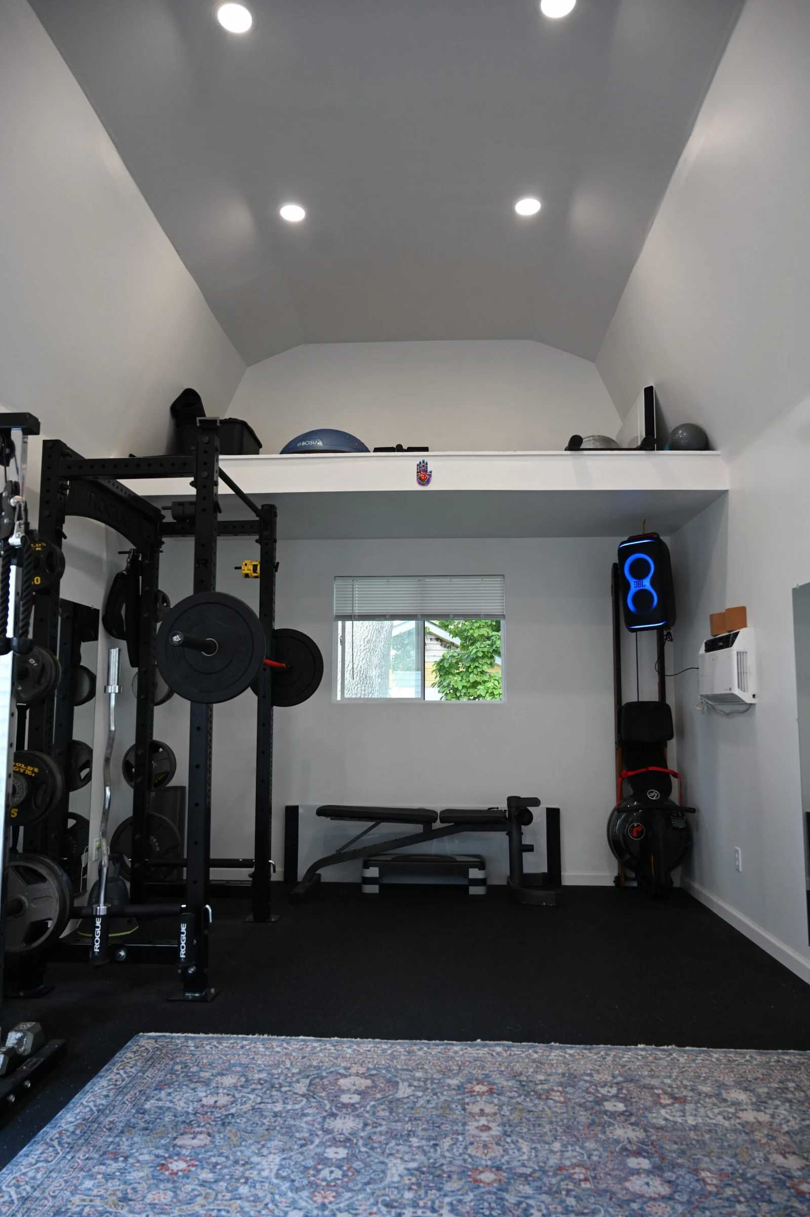 Premier Pro Tall Barn home gym interior with loft