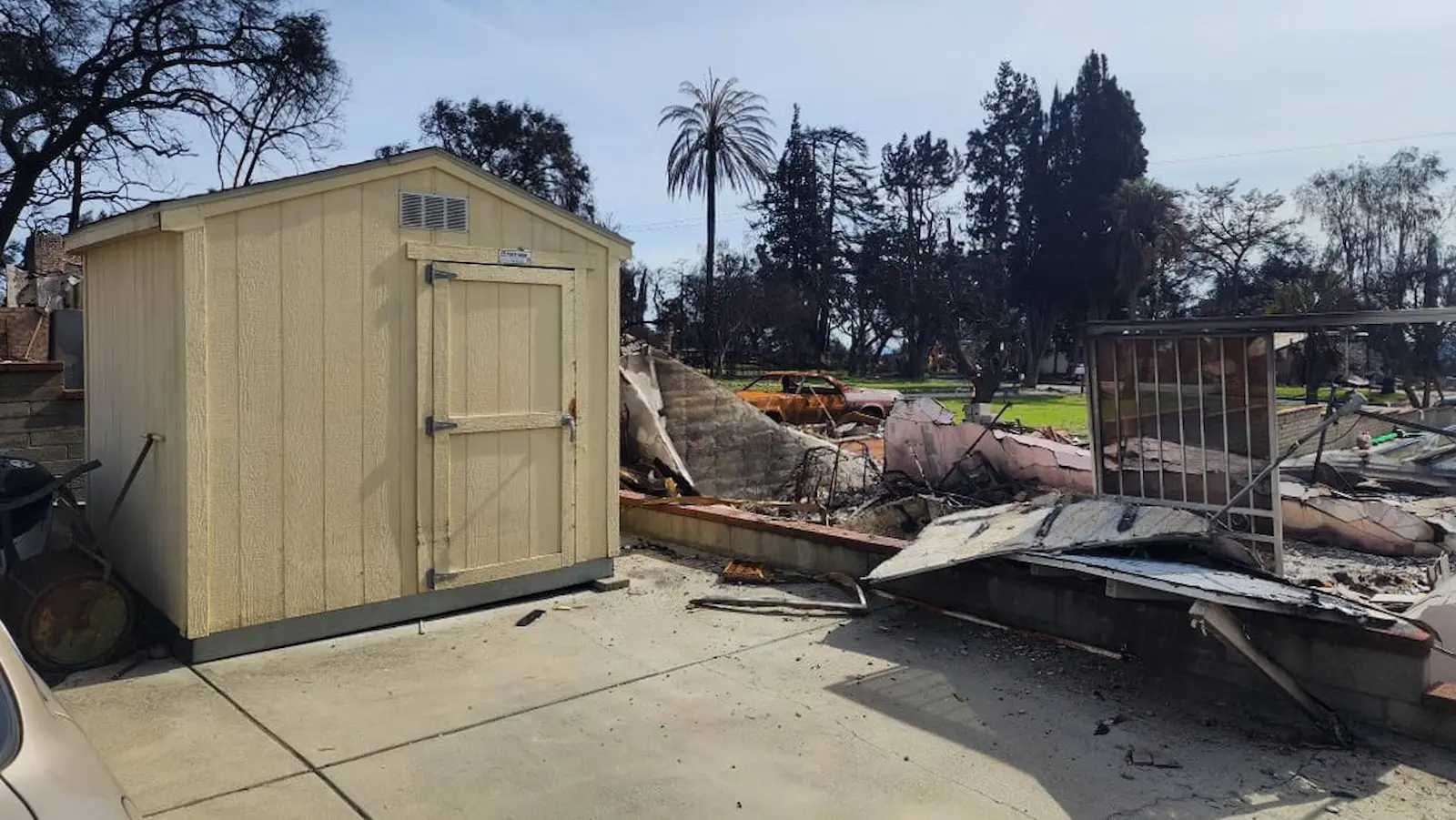 Premier ranch building standing next to burned down buildings