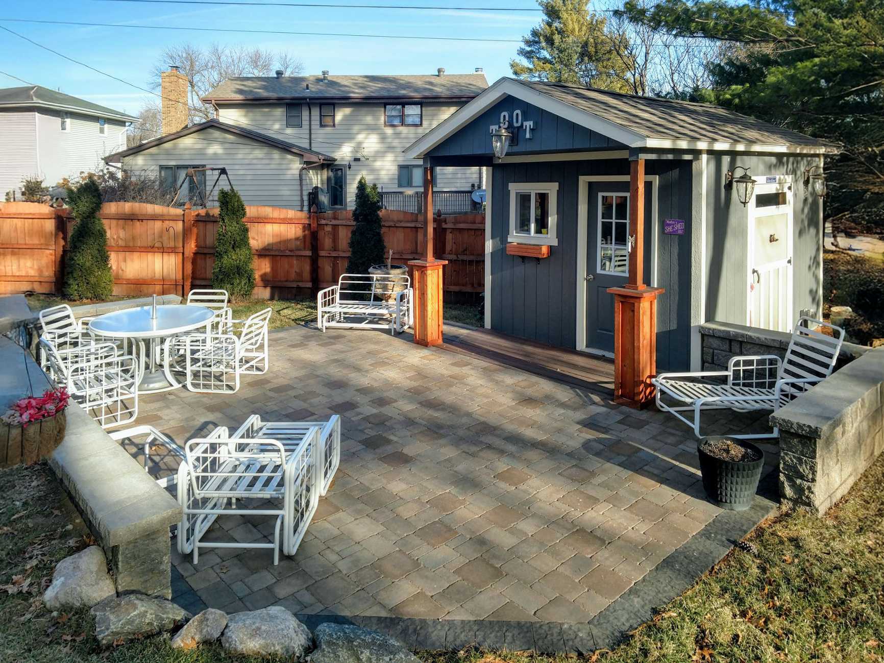 A Premier Pro Ranch Weekender in the backyard for guest space and storage.