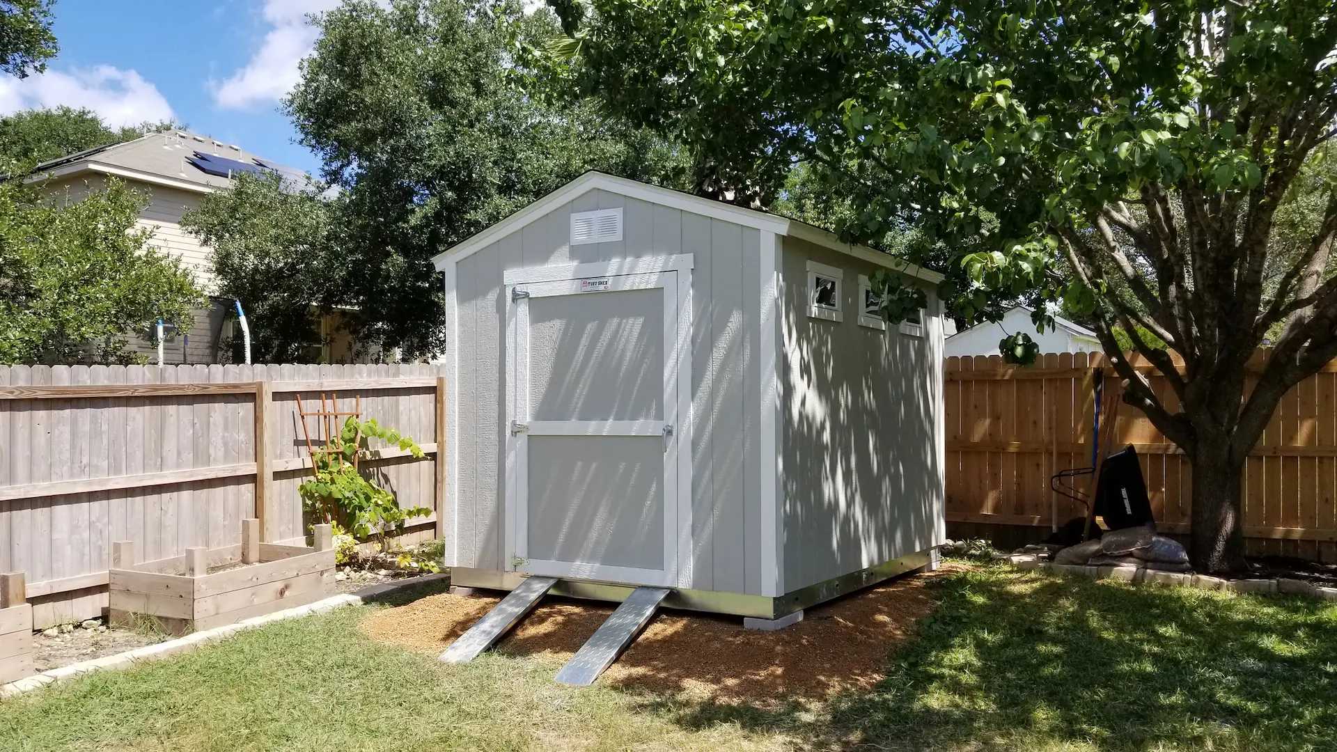 Premier Ranch in a backyard under a blue sky with heavy duty ramps