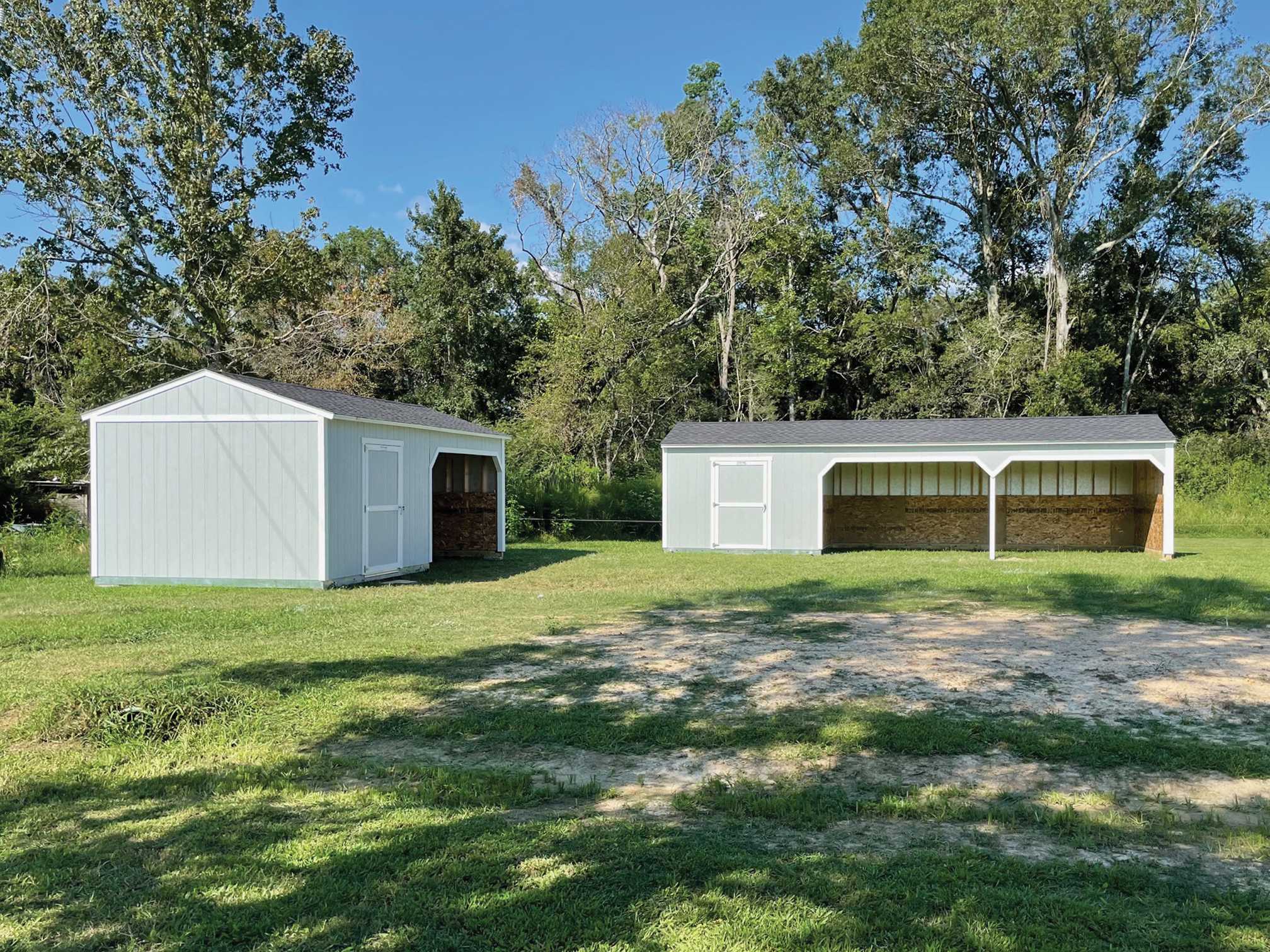 A premier loafing shed used for housing animals.