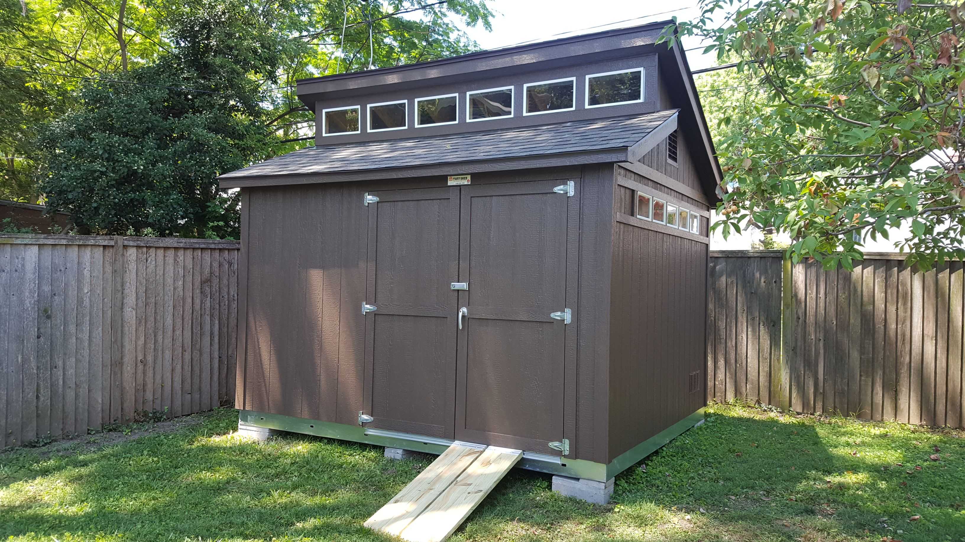Exterior brown premier pro tall ranch with clerestory upgrade and transom windows