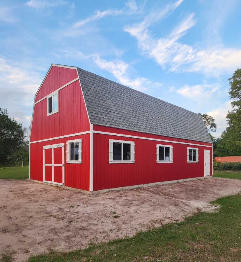 A premier barn garage for storing a car or other tools for hobbies.