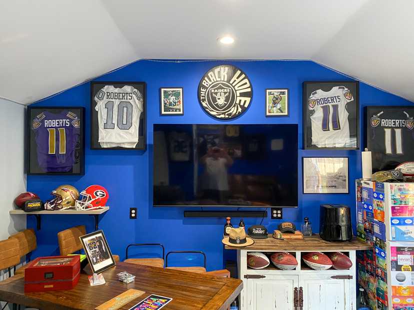 A premier pro tall ranch that is used for a football man cave.