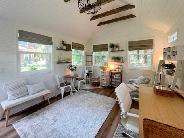 A premier pro tall ranch that is a guest space and a office.