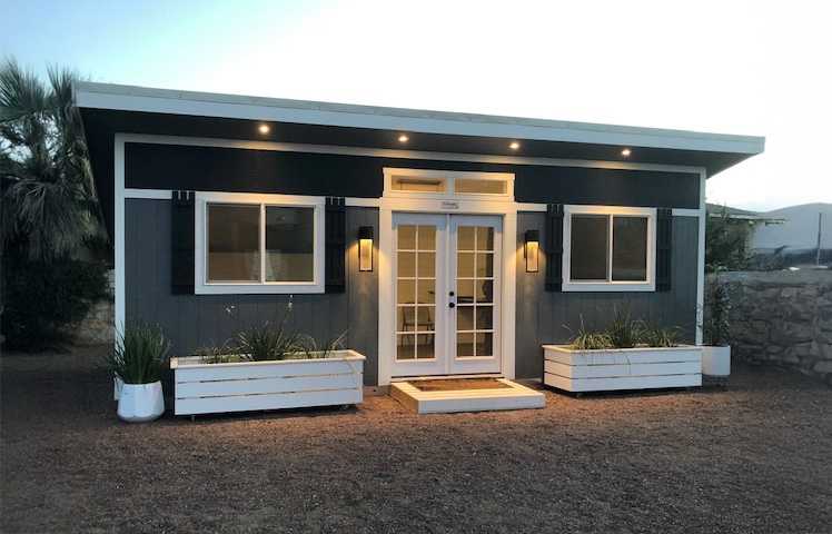 A premier pro studio with interiors that fit a she shed.