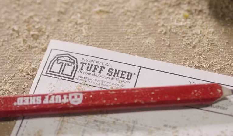 tuff shed blueprint paper with a pencil