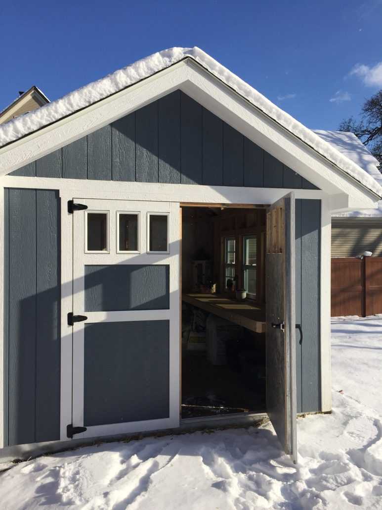 Exterior of the Premier Pro Tall Ranch Gardening Shed Front Door